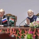 Prime Minister Narendra Modi and Russian President Vladimir Putin during the India-Russia Business Forum, in New Delhi. (narendramodi.in via PTI Photo)