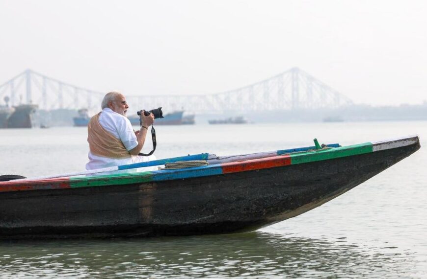PM takes boat ride on Hooghly river in Kolkata, tries his hand at photography